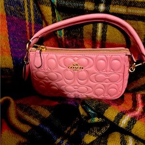Coach Embossed Nolita 19